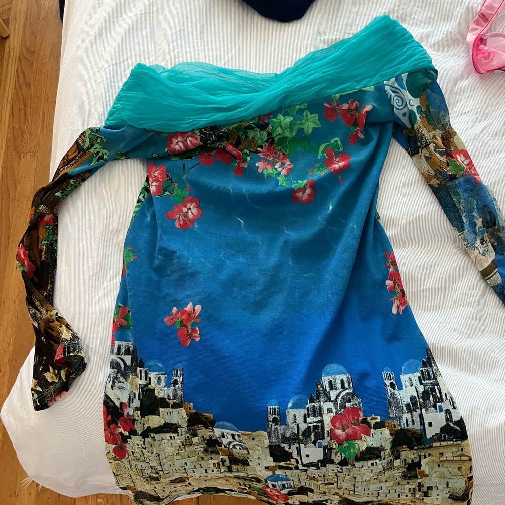 Gorgeous and unique off the shoulder save the queen mini dress